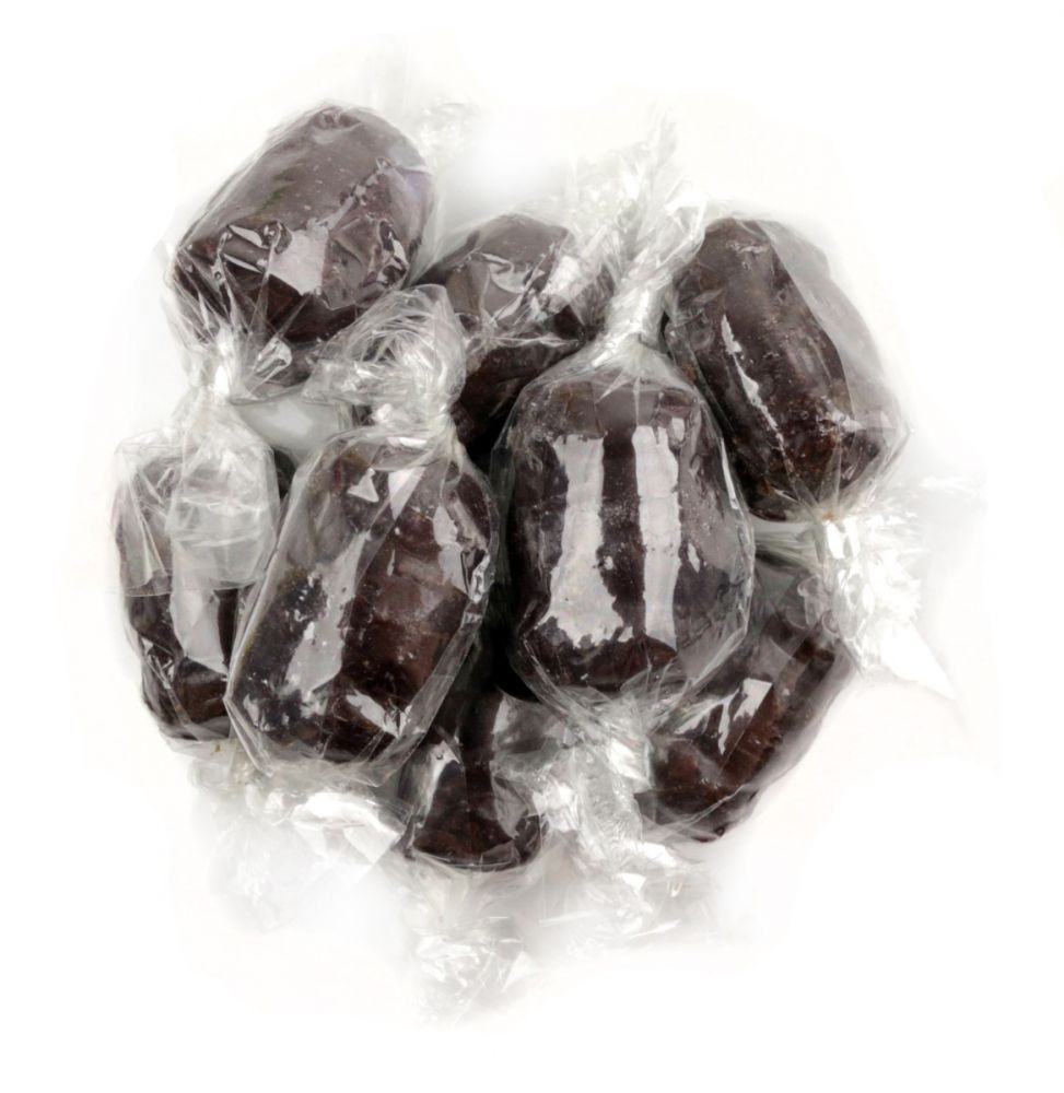 Individually wrapped Quality Root Beer Barrel hard candies, many dark brown, black, approx 65 per pound.