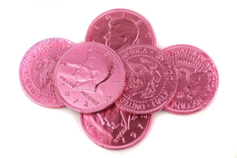 Pink chocolate coins, 1.5-inch diameter, US half dollar design, wrapped in shiny pink foil. Approximately 80 coins per pound.