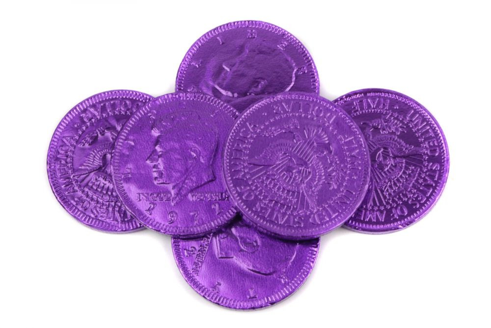 Bright purple foil-wrapped milk chocolate coins, 1.5 inch, US half dollar design. Approx 80 coins per pound.