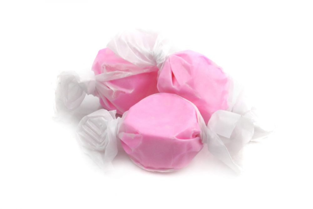 Light pink bubble gum salt water taffy, approximately 60 individually wrapped pieces per pound.