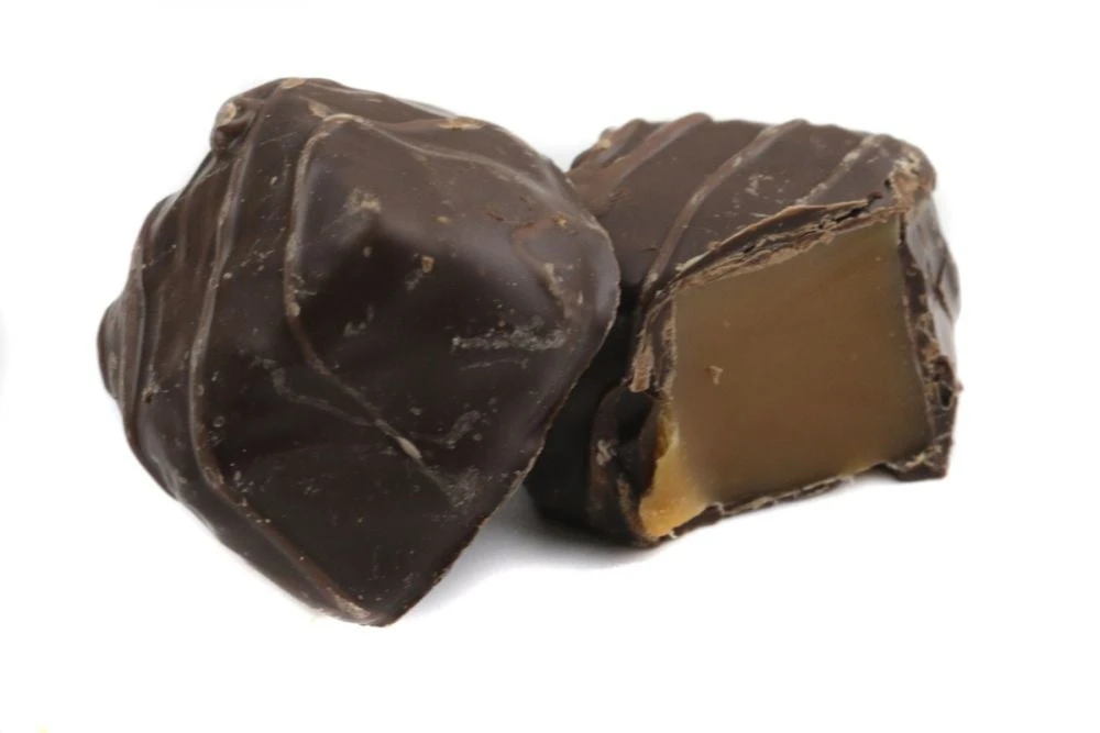 Ashers Dark Chocolate Vanilla Caramels, rich dark chocolate exterior, smooth vanilla caramel interior, approximately 25 per pound.