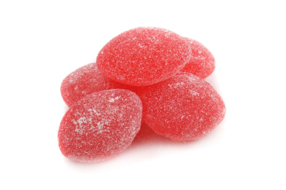 Bright red, sugar-sanded Claey's Wild Cherry hard candy, approximately 75 pieces. Old fashioned retro cherry flavor.