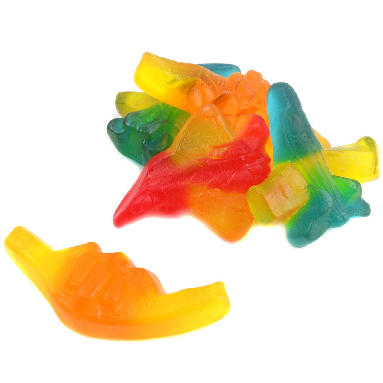 Colorful assorted jet plane gummies, bulk unwrapped, approx 55 pieces.