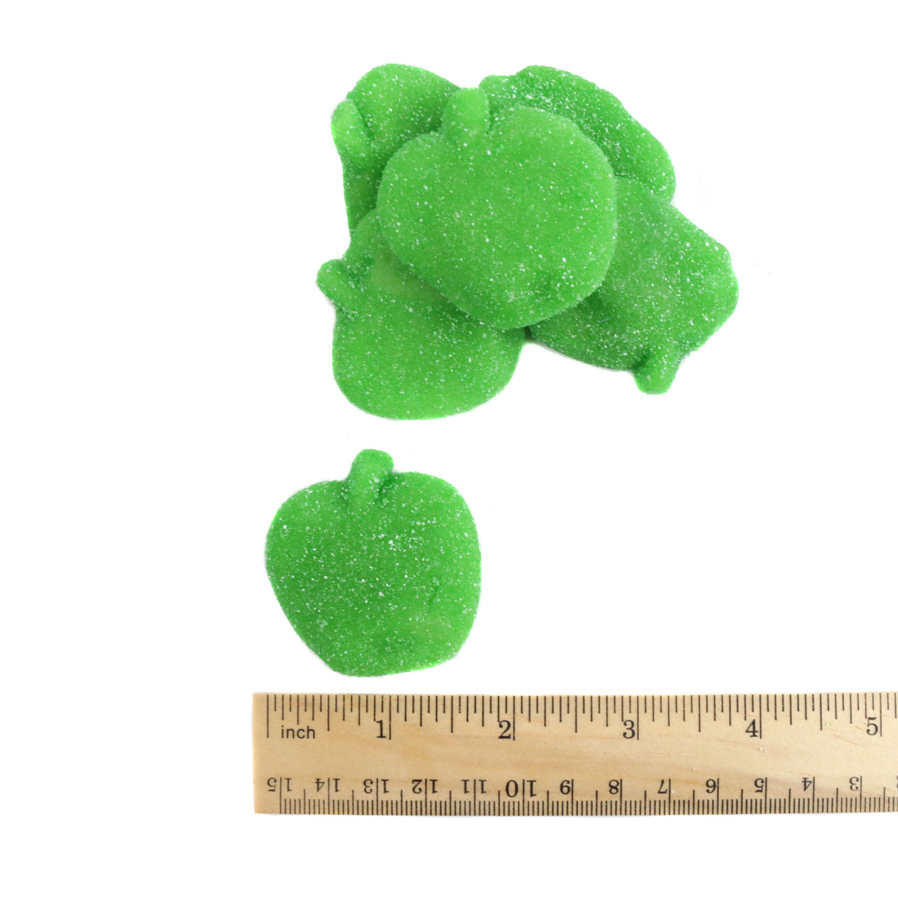 Green, apple-shaped gummy sour candies with a sugar coating. Approximately 36 pieces per pound.