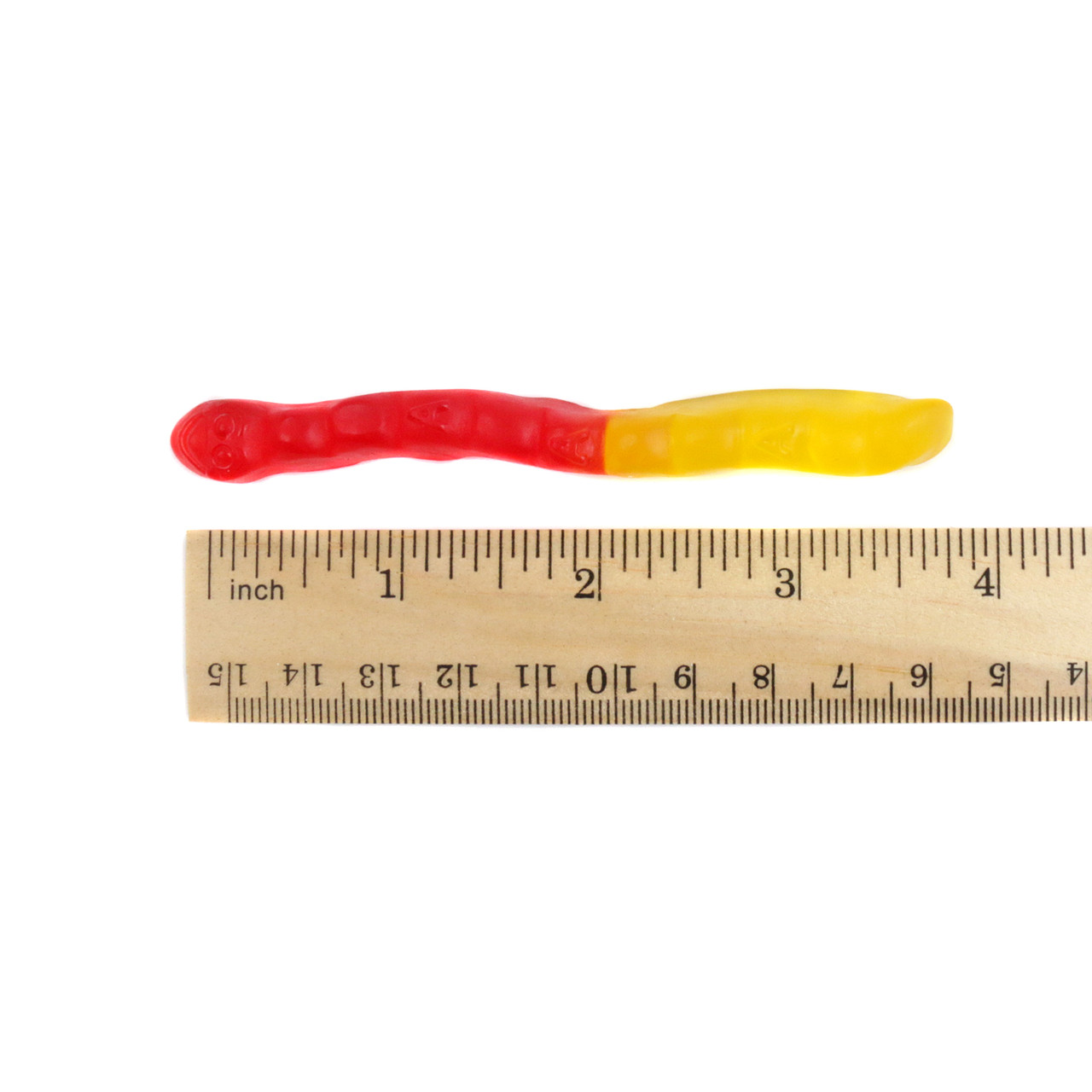 Albanese 4-inch gummy worms, assorted fruit flavors in vibrant red, orange, yellow, green, pink, and clear colors.