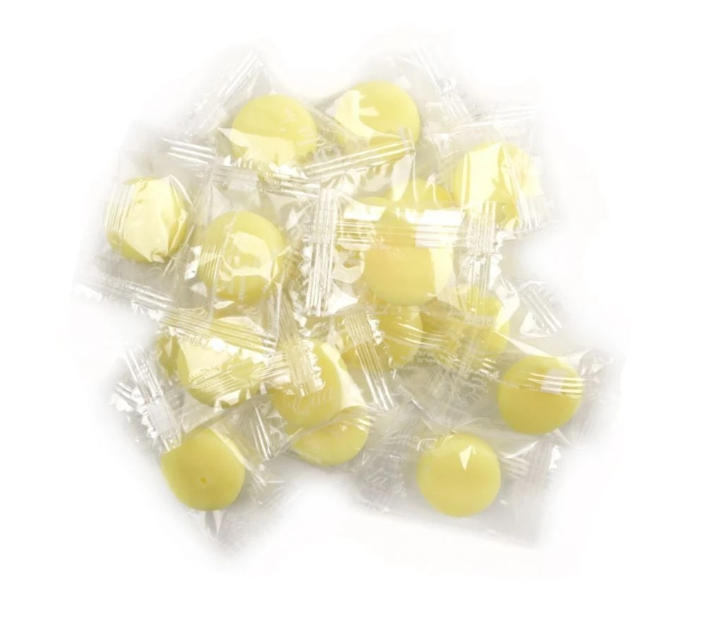 Eda's Pina Colada Sugar Free hard candy, tropical yellow and white pieces, coconut pineapple flavor, approx 80 pieces.