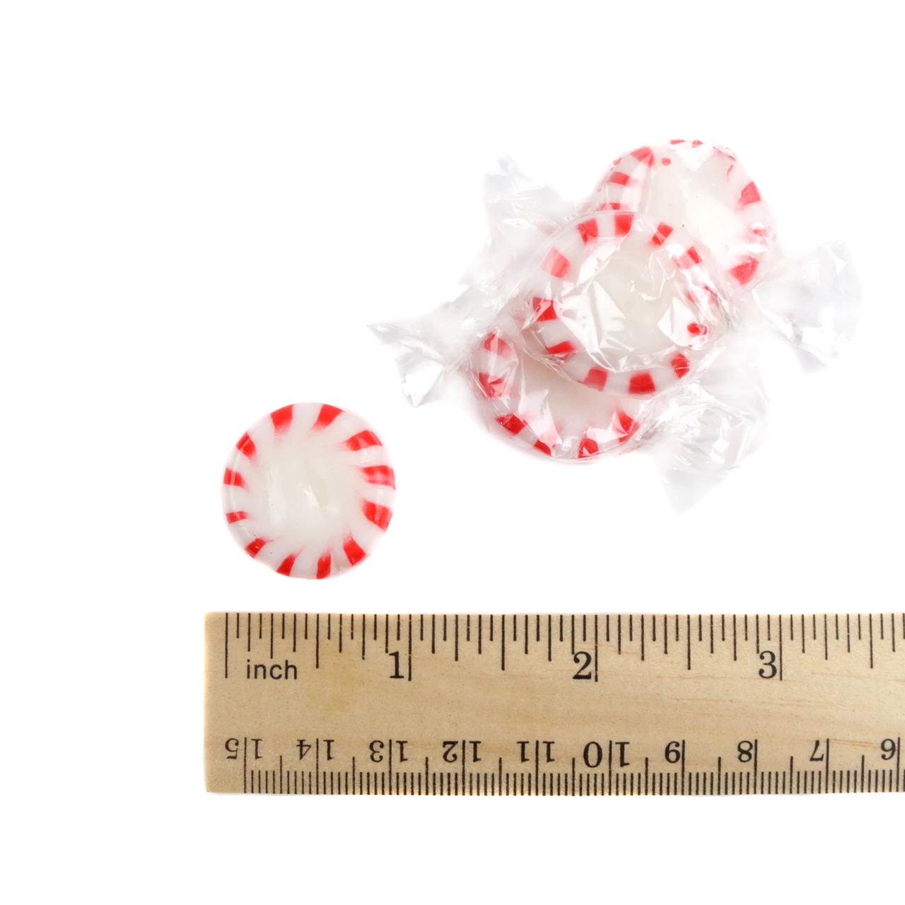Arcor Peppermint Starlight Mints, round red and white striped hard candies, approx 90 individually wrapped mints per pound.