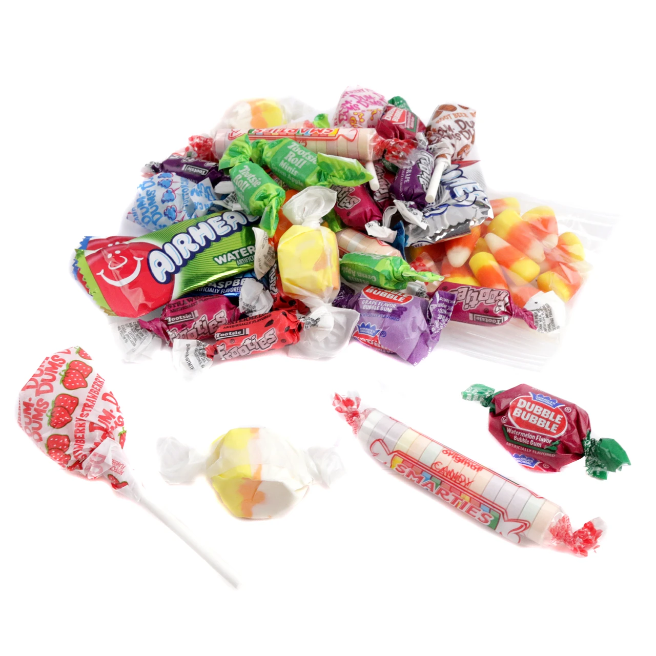 Colorful assortment of individually wrapped Halloween candies including Airheads and Candy Corn.