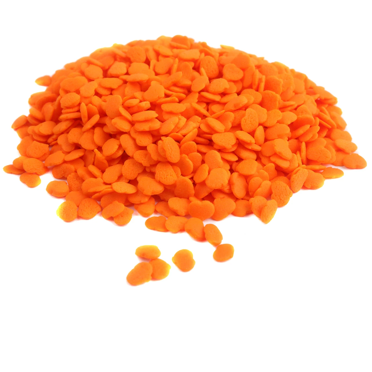 Bright orange pumpkin shaped sprinkles for Halloween baking, cookies, and dessert toppings.