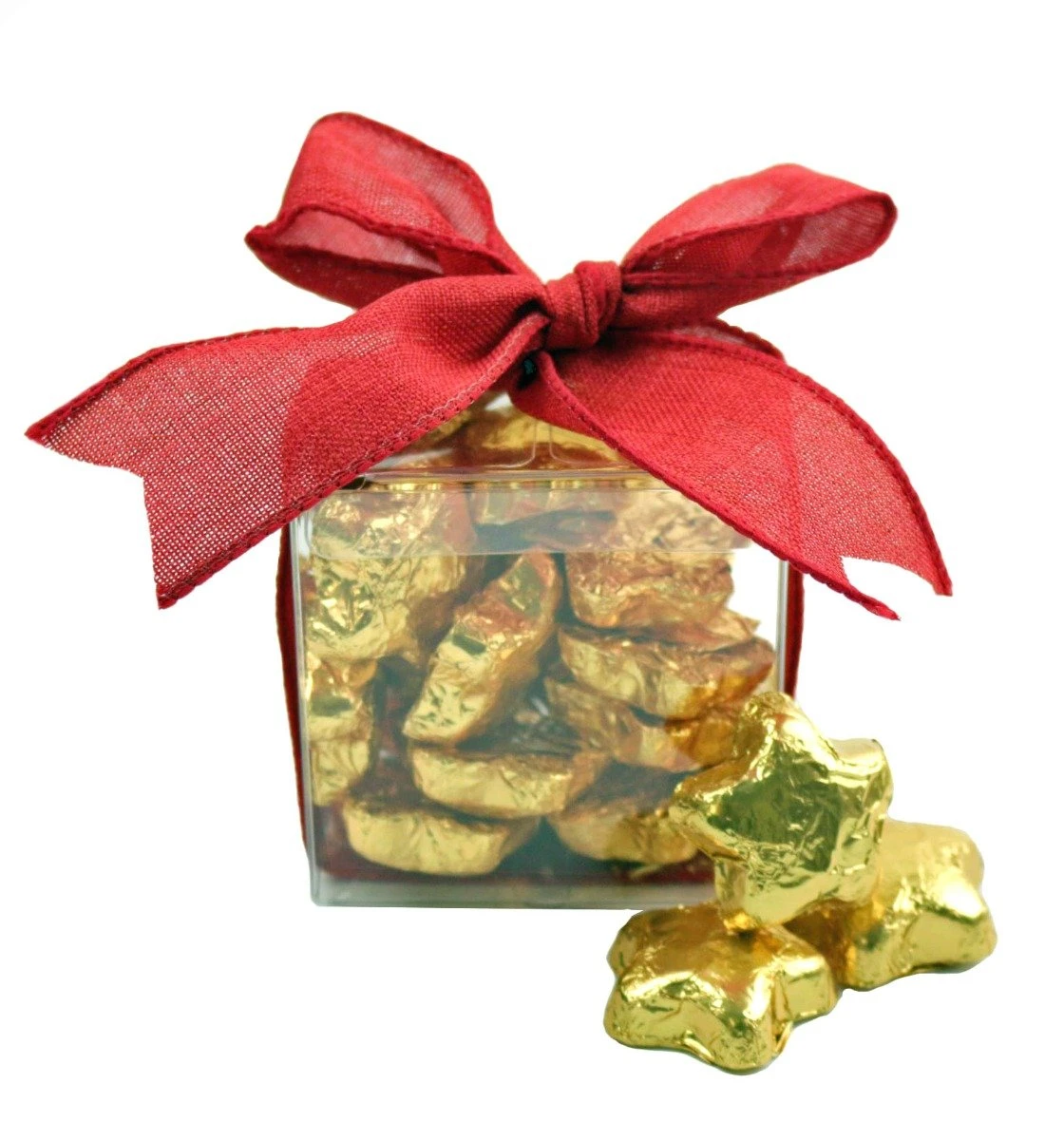 1/2 lb Madelaine solid milk chocolate gold foil stars in a festive treat cube with a bow, ideal Christmas gift.