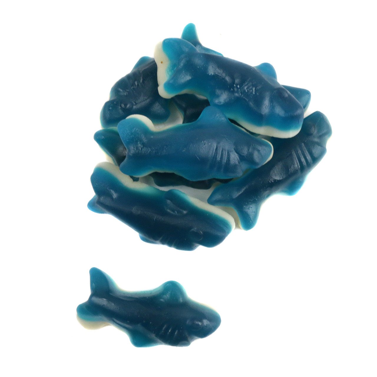 Vibrant blue gummy sharks with white marshmallow foam bottoms, blue raspberry candy for summer snacks.