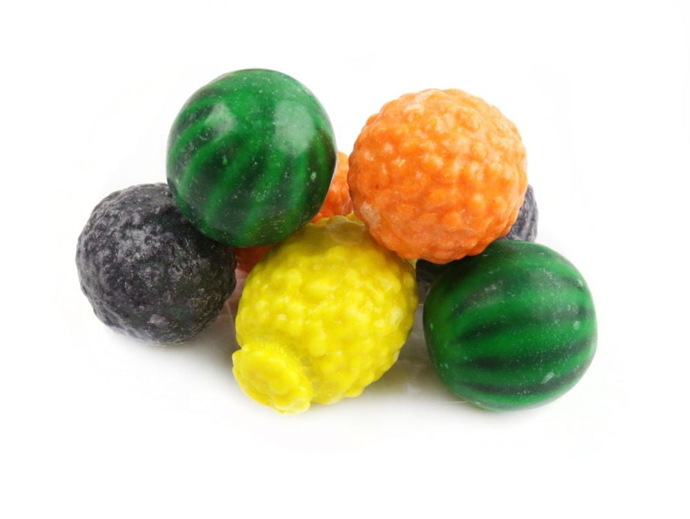 Dubble Bubble Fancy Fruit Gumballs, assorted colorful fruit shapes like watermelon, lemon, orange, plum. Approx 55 per pound.