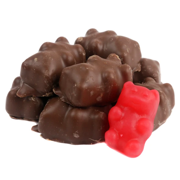 A mound of Sweets Candy Company Chocolate Covered Cinnamon Bears stacked together, perfect for candy buffets, holiday treats, and snacking.