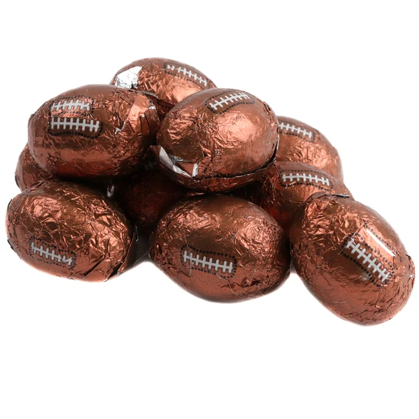 Chocolate flavored foil-wrapped mini footballs, with white laces, approximately 90 per pound.