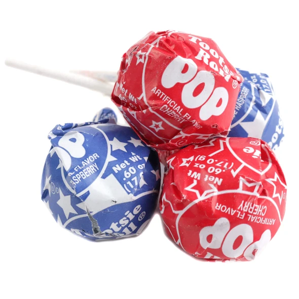 Red and blue patriotic Tootsie Pops, approx. 24 per pound, with Blue Raspberry and Cherry flavors, 4th of July candy.