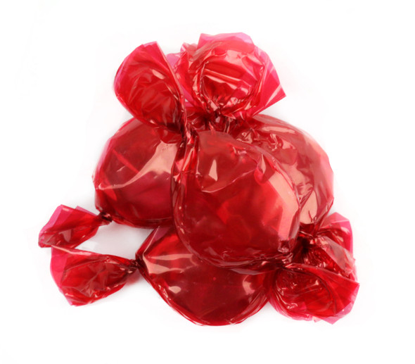Arcor vibrant red, spicy cinnamon hard candy discs, individually wrapped, approx 75 pieces per pound.