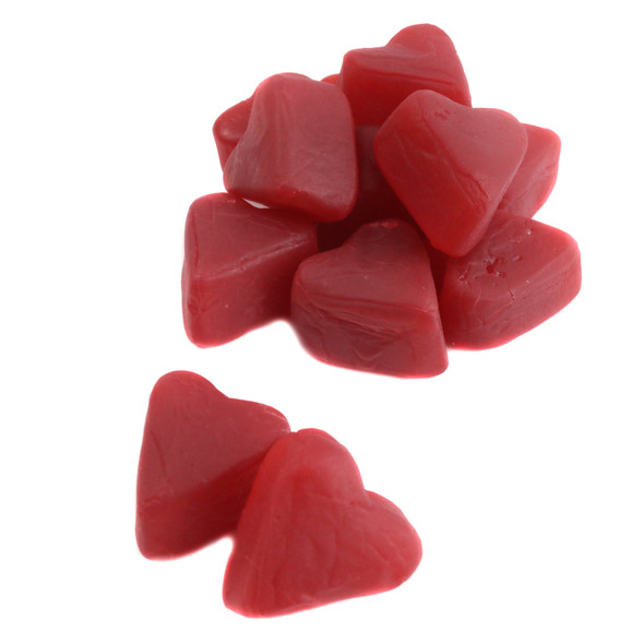 Fiery red heart-shaped cinnamon juju hearts candy, sweet & spicy, approx. 80 pieces per pound. Perfect for Valentine's Day.