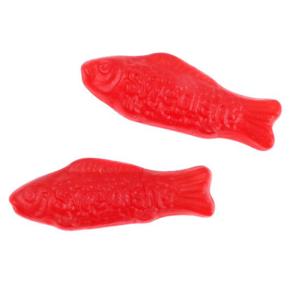Vibrant red Swedish Fish, chewy cherry candy, classic fish shape, approx 55 pieces per pound.