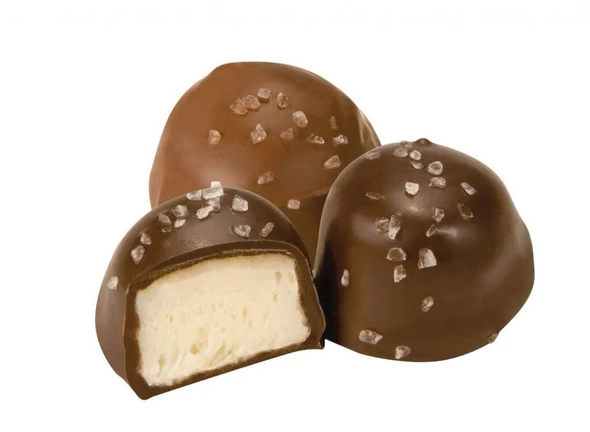 Ashers milk chocolate vanilla butter creams, approx 27 brown candies per pound, with visible white sea salt topping.