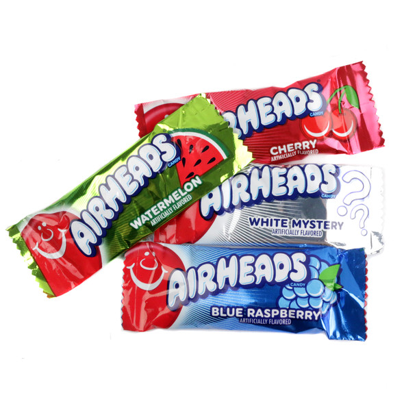 Mini assorted Airheads candy, vibrant red, blue, green pieces, individually wrapped, approx. 40 per pound.