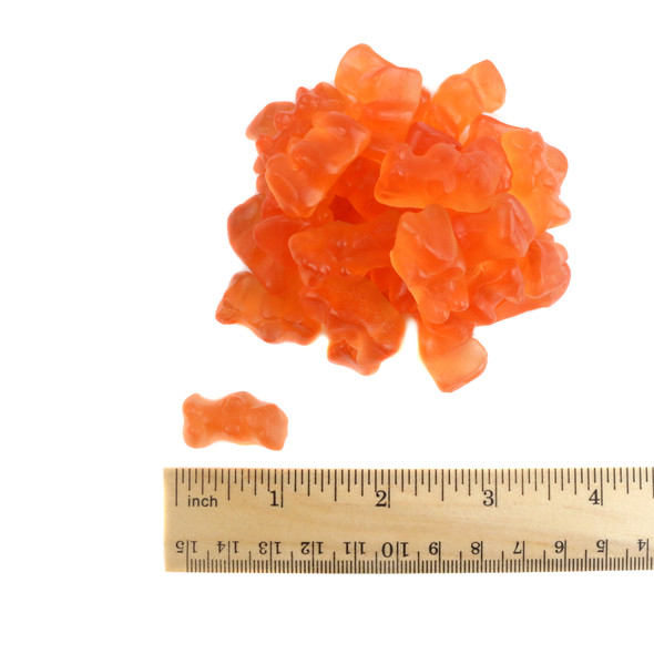 Pinkish-orange Rosé Gummy Bears, approx 125 per pound. Sweet, chewy, aromatic champagne candy.