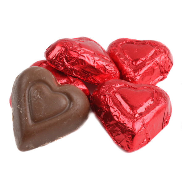 Red mini milk chocolate hearts, individually wrapped in bright red foil, approx. 55 per pound, ideal Valentine's candy.