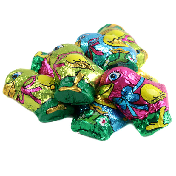 Bright, colorful foil-wrapped Madelaine solid milk chocolate Easter chicks, approx 50 per pound.