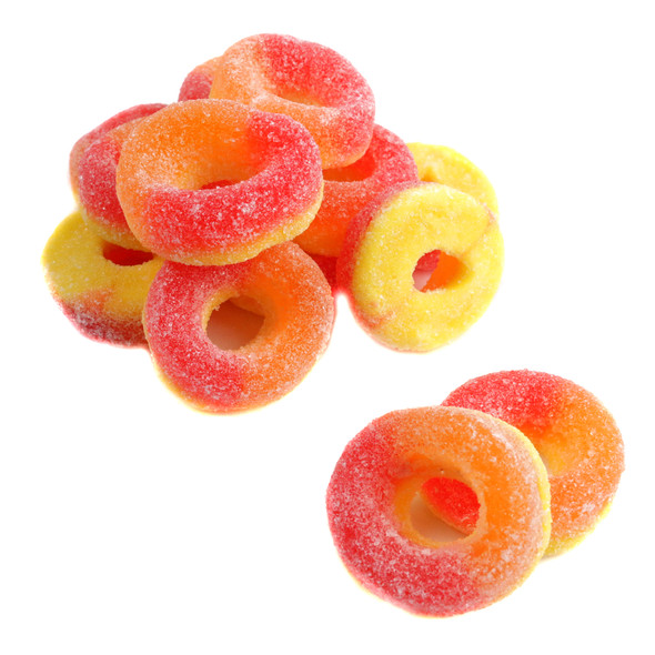 Kervan Gummy Peach Rings, bright orange with a light sanded sugar coating. Approx 55 rings per pound, delicious peach candy.