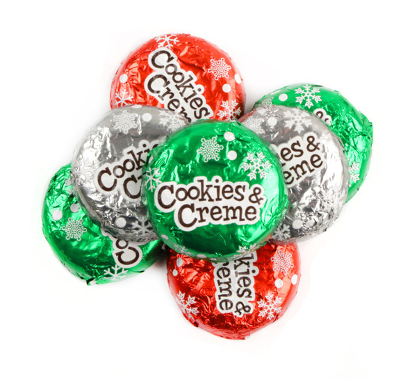 Palmer Cookies & Cream Patties, creamy candy with cookie bits, approx. 48 per lb, vibrant red, white, green foil wrapped.