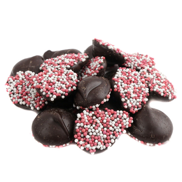 Reppert Valentine dark chocolate discs, 130 per pound, adorned with red, pink, white nonpareils for Valentine's Day.