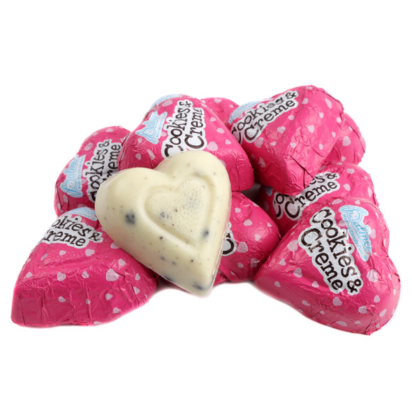 Pink heart-shaped Cookies and Cream Valentine Hearts with crunchy cookie bits, approx 45 pieces per pound.