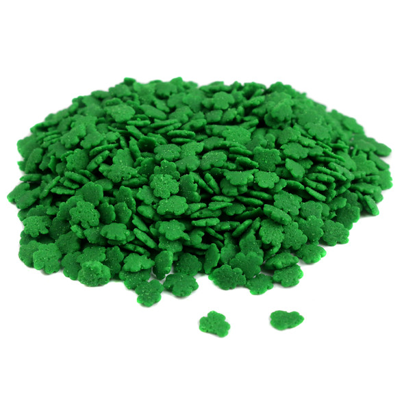 Green shamrock-shaped sprinkles, perfect for St. Patrick's Day cookies, cupcakes, and cakes.