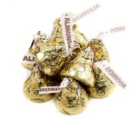 Gold Hershey's Kisses with Almonds, wrapped in shiny gold foil, milk chocolate, crunchy texture, approx 90 per pound.