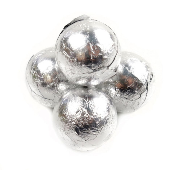 Bright silver foil wrapped solid milk chocolate balls, 3/4 inch diameter, approx 60 per pound.