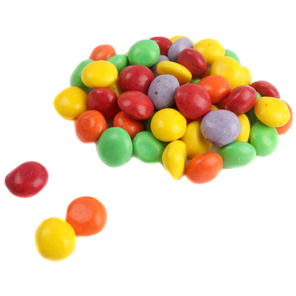 Vibrant mix of mini fruit chewy candies showing a smooth, glossy finish