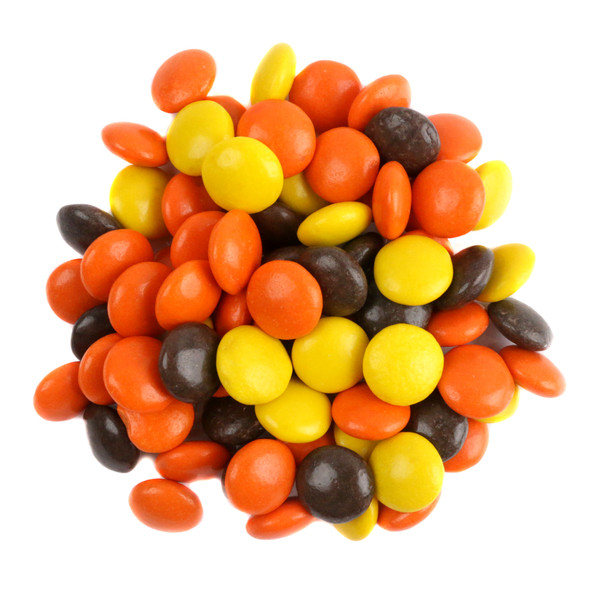 Reese's Pieces, small button-size yellow, orange, brown peanut butter candy. Sweet, salty, approx 500 pieces per pound.