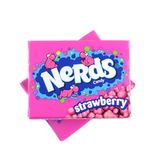 Many bright pink Nerds Mini Boxes, strawberry flavored tiny tangy crunchy candy, bulk wrapped.