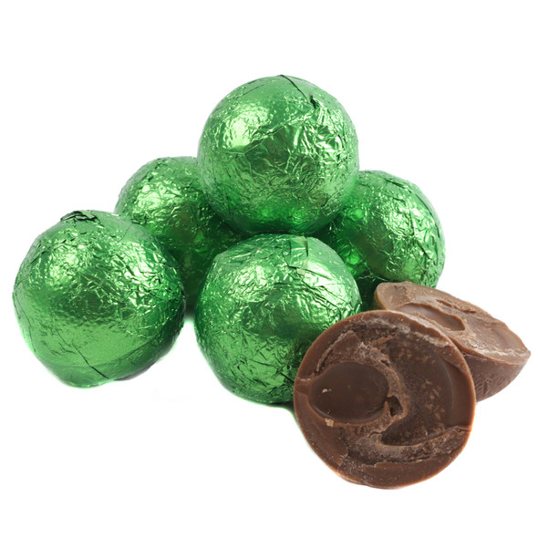 Vibrant green foil wrapped double chocolate balls, rich creamy milk chocolate, individually wrapped, approx 35 per lb.