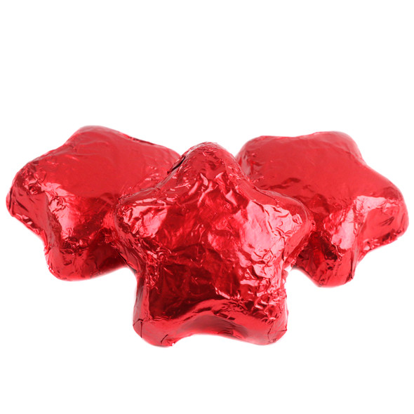 Madelaine red foil-wrapped milk chocolate stars, 1.5 inches each, approximately 45 stars per pound.