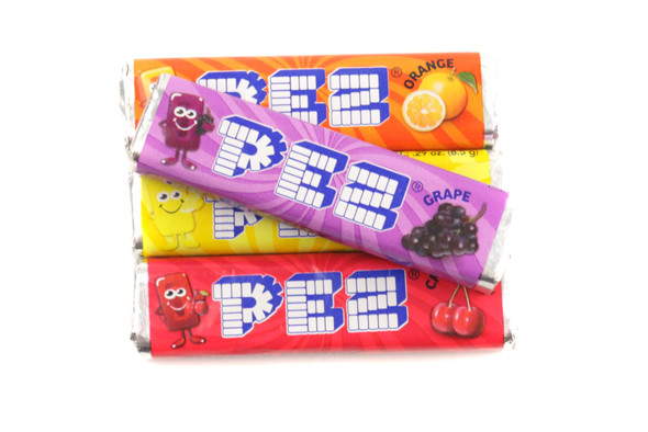 Bulk 20lb Pez delicious assorted fruity candy refills, many colorful rolls for dispensers. Approx 1,000 rolls.