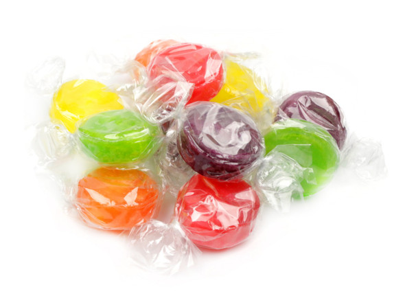 40 LB case assorted fruit hard candy buttons, individually wrapped. Orange, grape, cherry, lemon, lime colors.