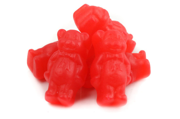 Reddish-brown Juju Cinnamon Bears, approx 1 inch large. Bulk 6/5lb case of hundreds of sweet, firm cinnamon gummy bears.