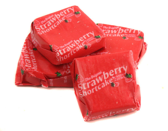 20lb case of vibrant red, square Strawberry Shortcake Taffy, approx. 900 pieces of chewy retro candy.