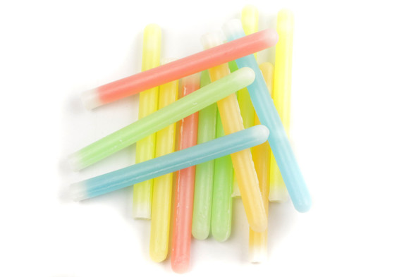 Colorful Nik-L-Nips wax sticks, 18.5lb bulk. Many approx 4-5 inch long sticks with fruit liquid candy.