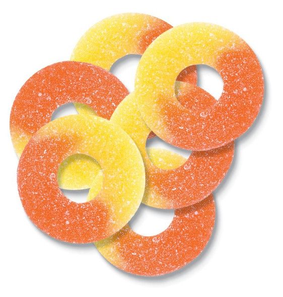 Large quantity of orange and yellow Albanese Peach Gummy Rings, sugar-coated, with juicy peach flavor.