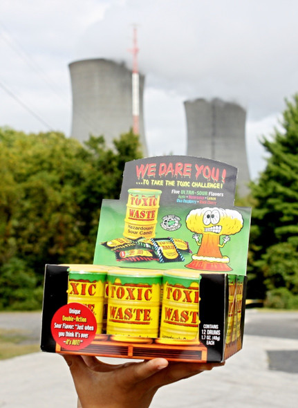 Toxic Waste Drums super sour hard candy. 144 nuclear waste drum containers, black cherry, apple, blue, lemon.