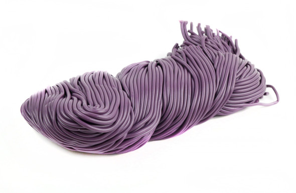 20lb box of long, chewy purple Grape Licorice Laces, approximately 36 inches each.