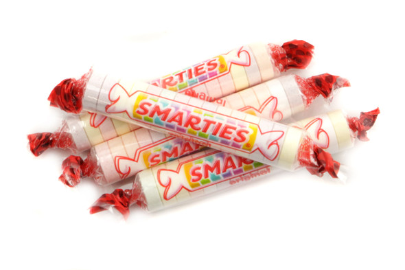 40lb bulk Smarties candy rolls. Many individually wrapped, colorful pastel discs, perfect for parties and sharing.