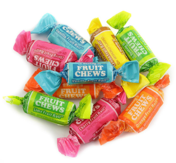 30lb bulk Assorted Fruit Chews Tootsie Rolls. Bright orange, white, yellow, green, red candy chews.