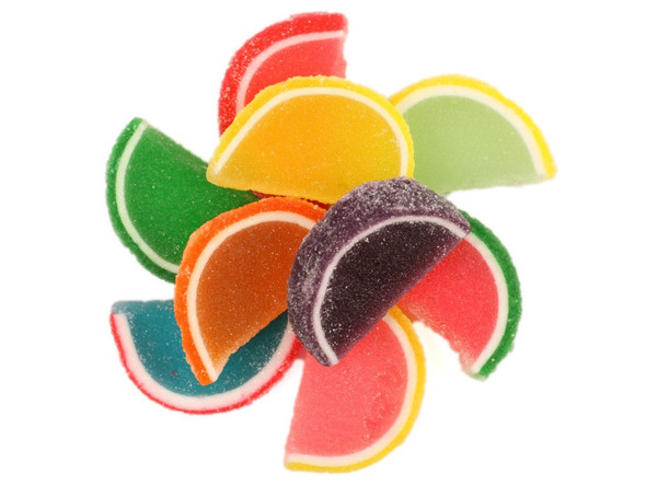 20lb bulk assorted jelly fruit slices candy, individually wrapped, sugar-drenched in blue, purple, red, yellow, orange.